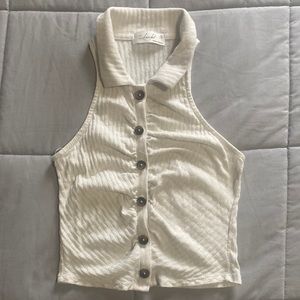 Juniors size “S” Skönhet brand sleeveless shirt. Cream color.
